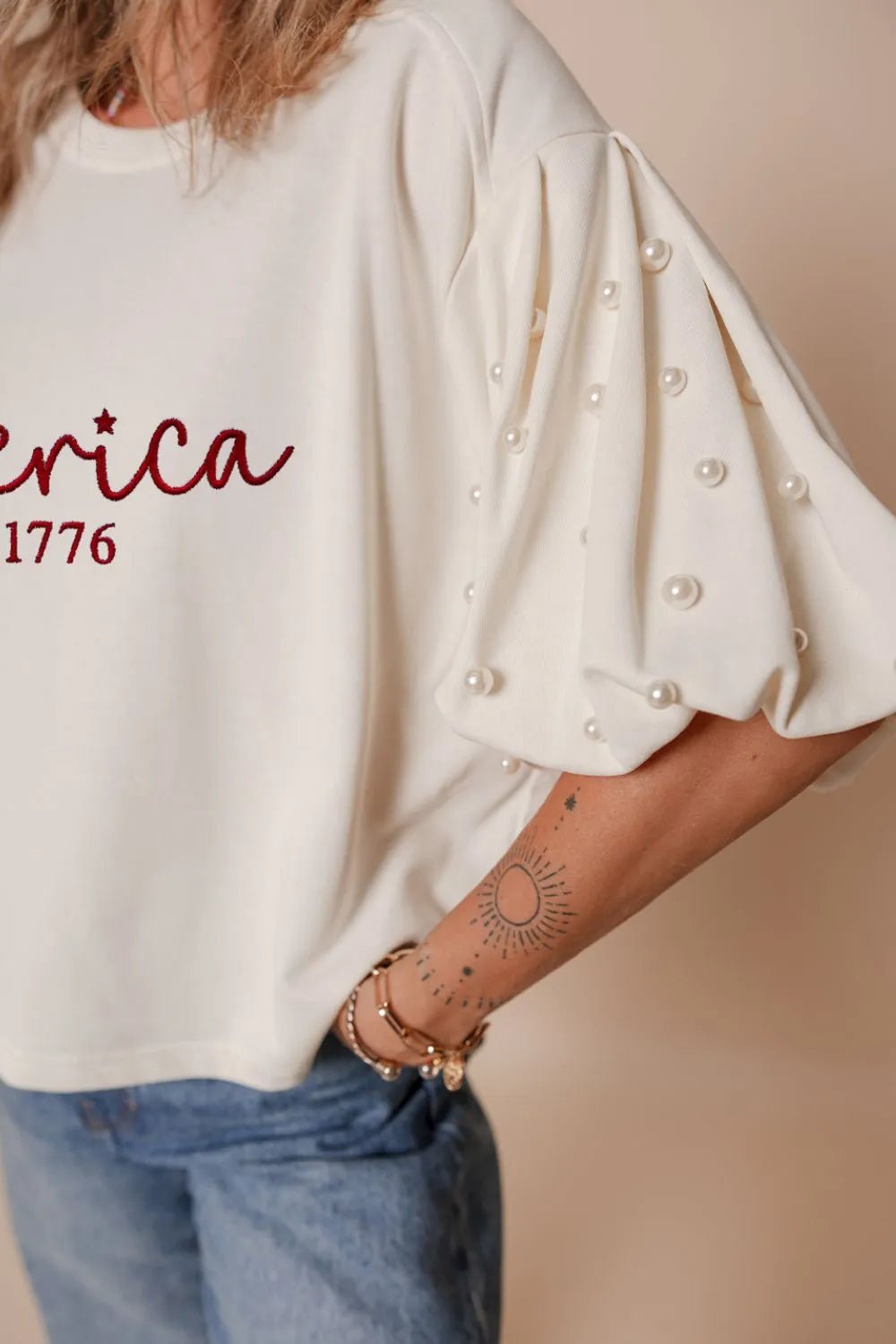 AMERICA EST 1776 Embroidered Pearl Beaded Sleeve T Shirt – White by Simply Love